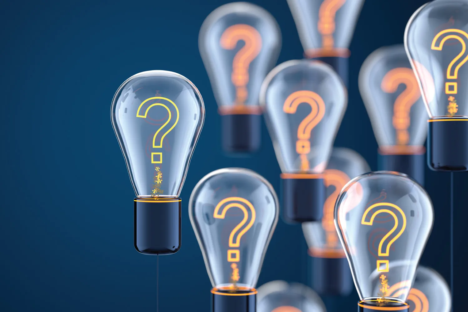 Key Considerations when Selecting the Right MSP for a group of light bulbs with question marks on them.