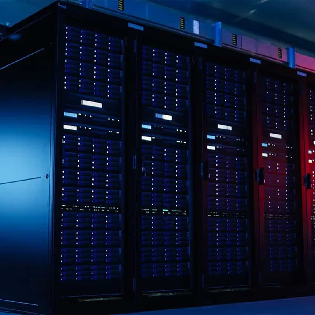 A row of physical servers running Windows Server in a data center, undergoing health checks.