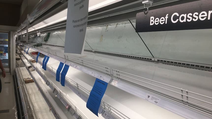 Empty supermarket shelves with signs indicating low stock for beef casserole products mirrored the urgency of a Sophos XGS Firewall Upgrade—both essential for securing what's valuable and protecting against unexpected shortages.