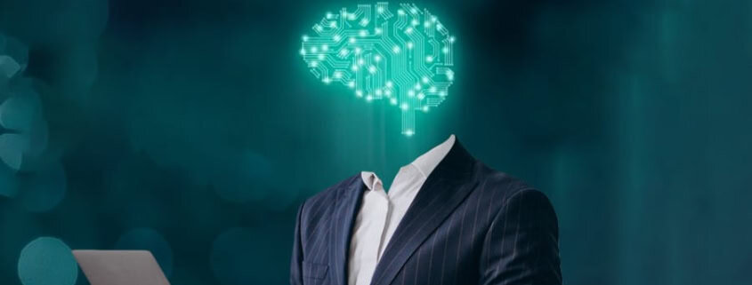 A suit-wearing figure with a glowing, circuit-like brain instead of a head, showcasing Project Axiom on a laptop against a dark, blurred background.