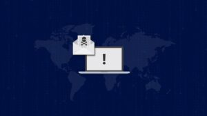 A laptop with an exclamation mark on its screen and an envelope with a skull icon, set against a world map, symbolizing the urgent need for ransomware protection for small business against global cybersecurity threats or email malware.