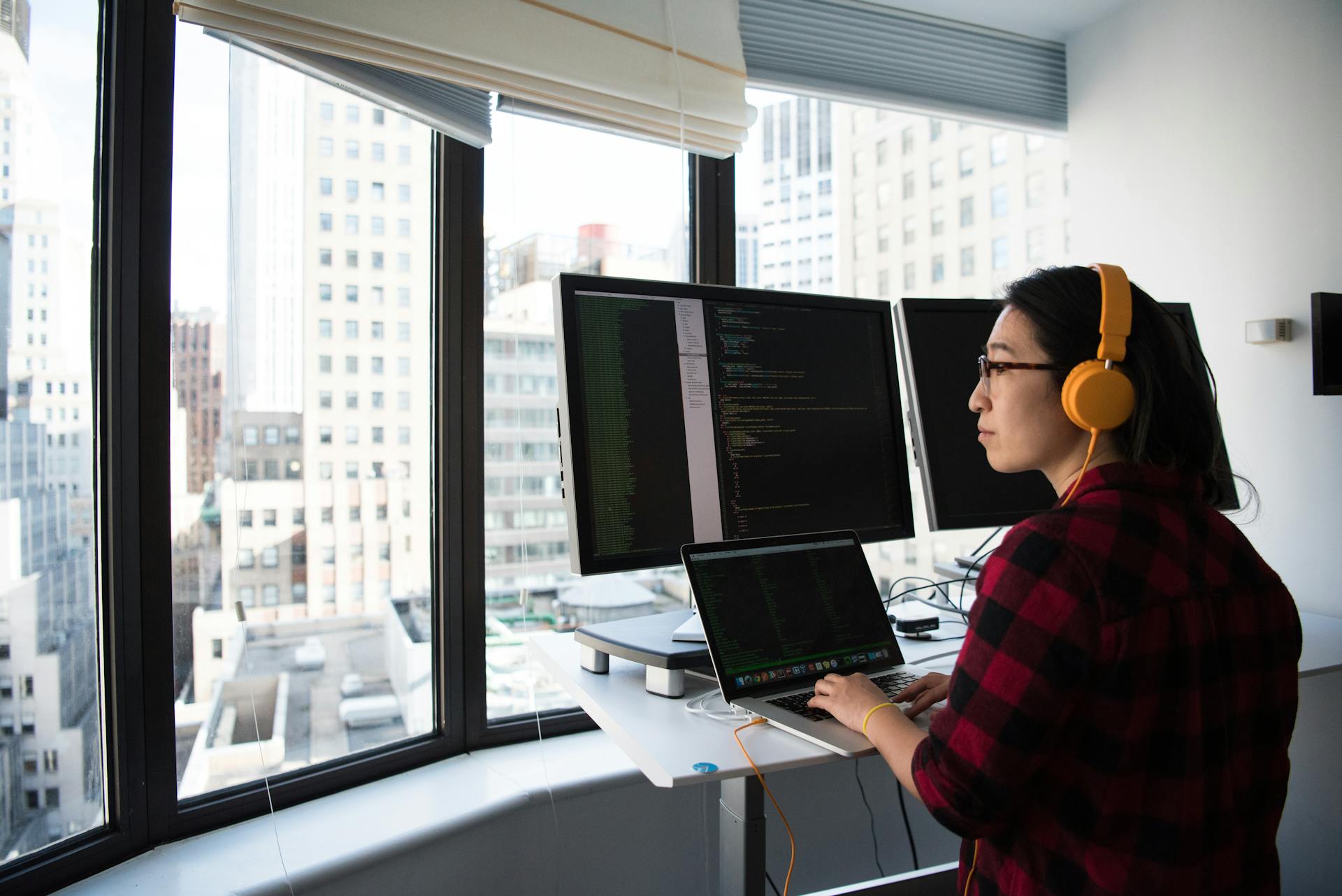 Small business team in Massachusetts office using managed IT services from Triton Technologies.