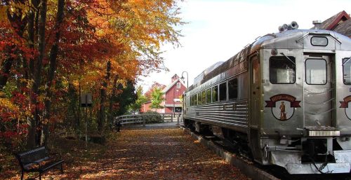 A silver train on the tracks, serviced by managed IT services in New Bedford.