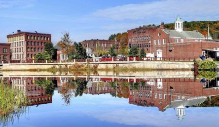 A city is reflected in the water. A city is reflected in the water.